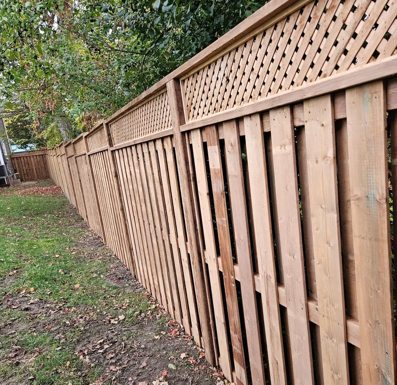 Wood privacy fence with a lattice top